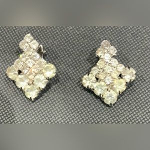 Elegant rhinestone silver earrings.  Clip